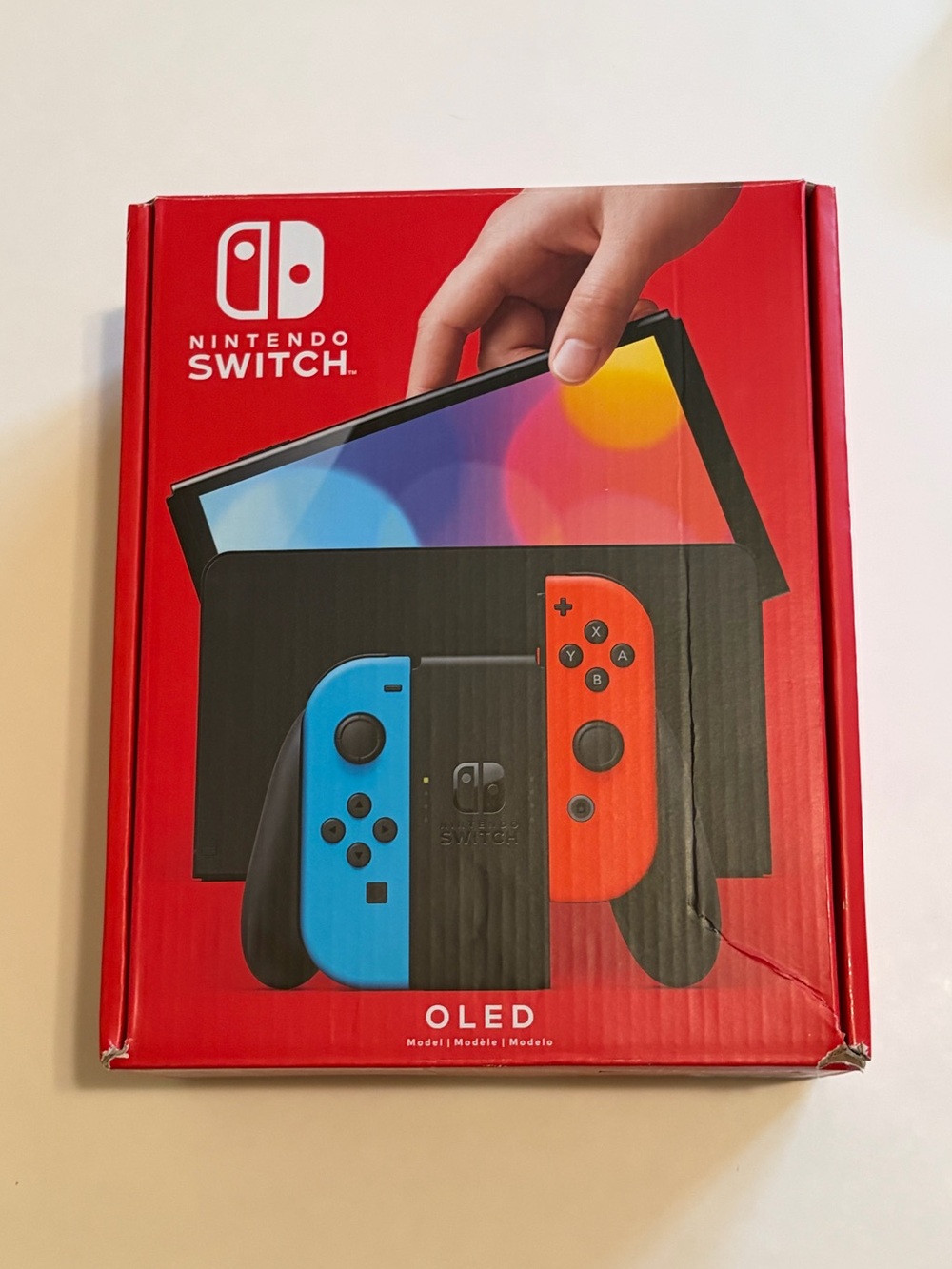 Nintendo Switch OLED Console with Blue & Red Joy-Con